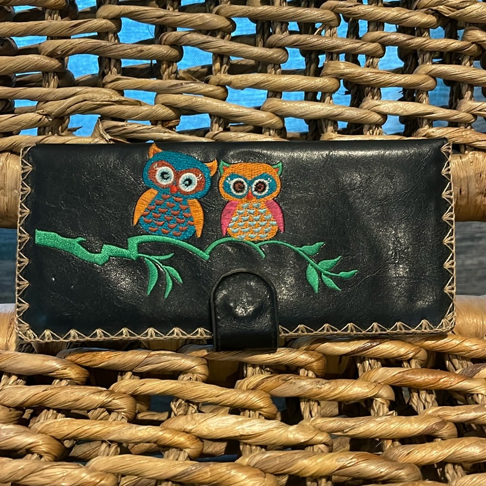 Lavishy leather 4x7.5 black embroidered wallet.